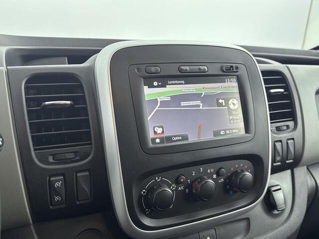Renault TRAFIC 1.6 dCi 120 Pk T29 L2H1 Luxe | Navigatie | Airco | Cruise control | Parkeersensor achter | Zijschuifdeur Rechts | Trekhaak | Passagiersbank | Mistlampen Voor | Betimmering Laadruimte |