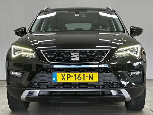 Seat ATECA 1.0 EcoTSI Style Business Intense/ Trekhaak/ Camera/ 17'' LMV/ Apple + Android/ LED Koplampen/ DAB+/ Navi/ Clima/ Cruise/ Elek. pakket/ Isofix/ Armsteun/ Multi. LEDER. Stuur/ Mistl./ PDC V+A/ Extra getint glas.