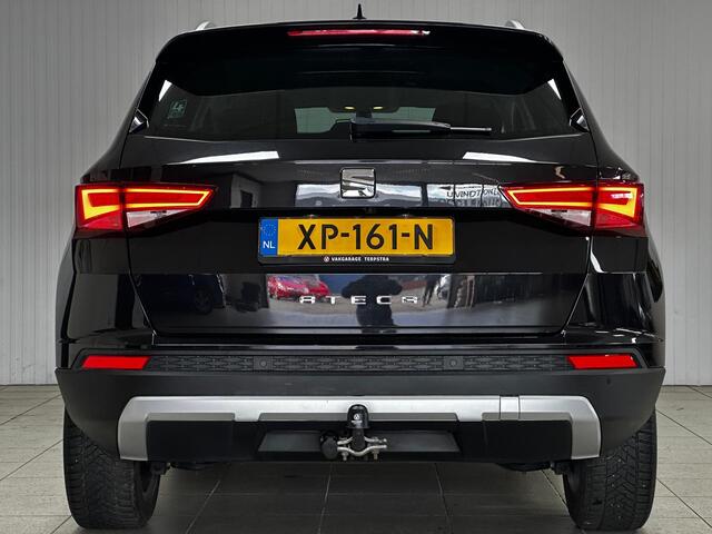 Seat ATECA 1.0 EcoTSI Style Business Intense/ Trekhaak/ Camera/ 17'' LMV/ Apple + Android/ LED Koplampen/ DAB+/ Navi/ Clima/ Cruise/ Elek. pakket/ Isofix/ Armsteun/ Multi. LEDER. Stuur/ Mistl./ PDC V+A/ Extra getint glas.