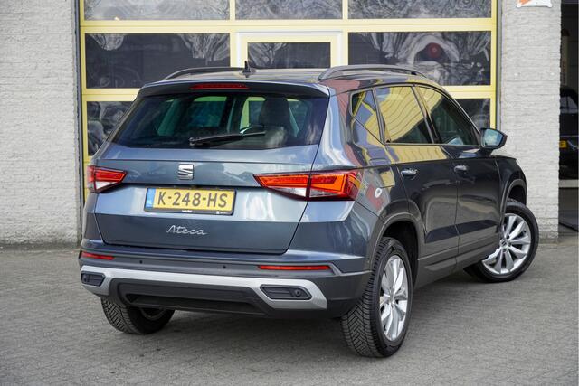 Seat ATECA 1.5 TSI Style Business Intense BJ2021 Lmv 17" | Led V+A | Pdc | Panoramadak | Elek. trekhaak | Achteruitrijcamera | App-Connect | Navi | Climate control | Cruise control | Lederen bekleding | Verwarmd stuur | Verwarmde voorstoelen | Extra getint glas
