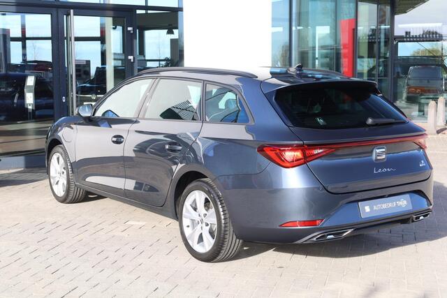 Seat LEON Sportstourer 1.5 TSI e-Hybrid FR Business 150KW/204PK DSG, uit voorraad leverbaar! 17 INCH Dynamic velgen, sportstoelen voor, zwarte dakhemel, dodehoek sensor, buitenspiegels elektrisch inklapbaar, slimme led, uitstap waarschuwing.