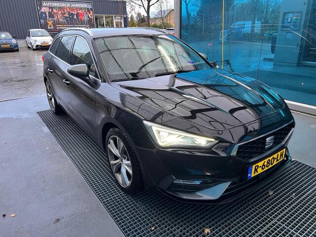 Seat LEON Sportstourer 1.5 TSI FR Business Intense dealer onderhoud camera side assist navigatie Full LED ACC adaptieve cruise control sfeerverlichting digital cockpit stoelverwarming parkeersensoren voor en achter stuurwiel verwarming lederen multifunctioneel stuu