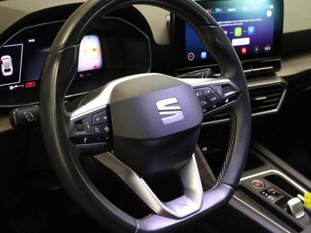 Seat LEON Sportstourer 1.5 eTSI XCELLENCE - STOEL & STUUR VERWARMING - PARKEERSENSOREN VOOR EN ACHTER - HOMMEL ONDERHOUDEN - NAVIGATIE - DRAADLOZE TELEFOONLADER - ACHTERUITRIJ CAMERA - APPLE CARPLAY/ANDROID AUTO - KEYLESS ENRTY & START