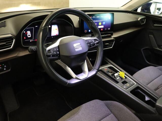 Seat LEON Sportstourer 1.5 eTSI XCELLENCE - STOEL & STUUR VERWARMING - PARKEERSENSOREN VOOR EN ACHTER - HOMMEL ONDERHOUDEN - NAVIGATIE - DRAADLOZE TELEFOONLADER - ACHTERUITRIJ CAMERA - APPLE CARPLAY/ANDROID AUTO - KEYLESS ENRTY & START