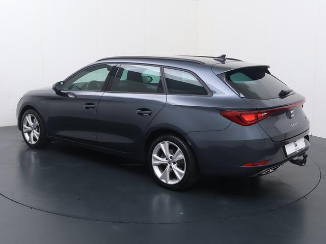 Seat LEON Sportstourer 1.4 TSI eHybrid PHEV FR Business Intense | 204 PK | SoH 100% | Adaptive Cruise Control | Achteruitrijcamera | Climate control | Dodehoek detectie | Keyless Entry | LED verlichting | Elektrische achterklep | Draadloze telefoonlader | Navigatiesysteem | Sfeerverlichting | Stuur- & Stoelverwarming | Apple Carplay / Android Auto |