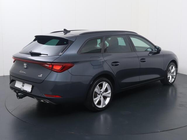 Seat LEON Sportstourer 1.4 TSI eHybrid PHEV FR Business Intense | 204 PK | SoH 100% | Adaptive Cruise Control | Achteruitrijcamera | Climate control | Dodehoek detectie | Keyless Entry | LED verlichting | Elektrische achterklep | Draadloze telefoonlader | Navigatiesysteem | Sfeerverlichting | Stuur- & Stoelverwarming | Apple Carplay / Android Auto |