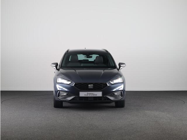 Seat LEON Sportstourer 1.5 TSI e-Hybrid FR PHEV First Edition 204pk | Verlengde garantie | Navigatie | Parkeersensoren | Achteruitrijcamera | Adaptieve cruise control |