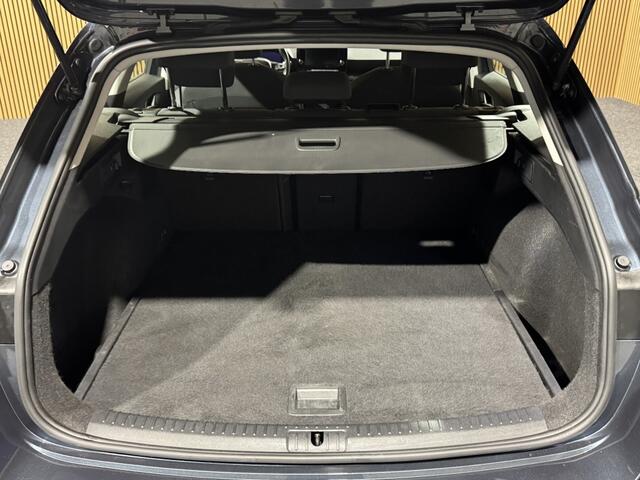 Seat LEON Sportstourer 1.5 eTSI Style Business | Stoel/stuurverwarming | CarPlay | Ad.Cruise | Clima |