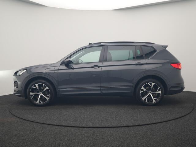 Seat Tarraco 1.4 TSI e-Hybrid FR Business Intense PHEV 245pk Dealer O.H. | Trekhaak Af Fabriek | Panodak | Adaptive Cruise | 360 Camera | Sportstoelen Memory & Verwarmd | Keyless | Blis | Stuur Verwarmd | Apple Carplay | Navigatie | DAB | 19" L.M | Plug In Hybrid