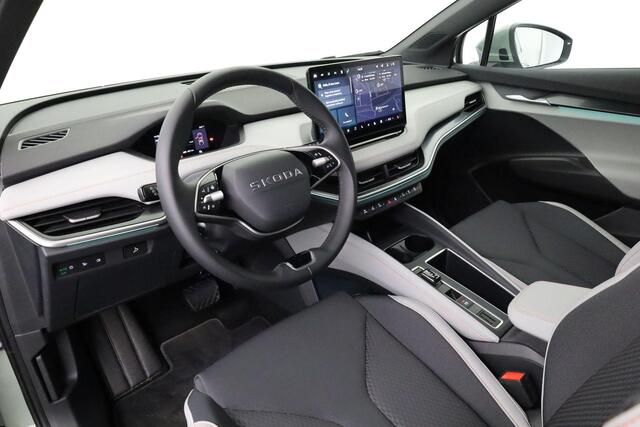 Skoda Elroq Intro Charlie 210 kW / 286 pk Business Edition | 20" Inch LMV | 3-Zone Climate Control | Camera | Dodehoekdetectie | Elektrische Kofferklep | Keyless-Entry | LED-Matrix verlichting | Stoel-, Stuur- en Achterbankverwarming | Timiano Green | Trekhaak El. We