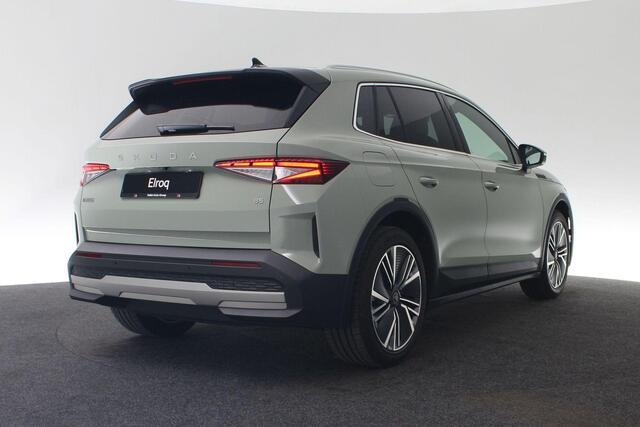 Skoda Elroq Intro Charlie 210 kW / 286 pk Business Edition | 20" Inch LMV | 3-Zone Climate Control | Camera | Dodehoekdetectie | Elektrische Kofferklep | Keyless-Entry | LED-Matrix verlichting | Stoel-, Stuur- en Achterbankverwarming | Timiano Green | Trekhaak El. We