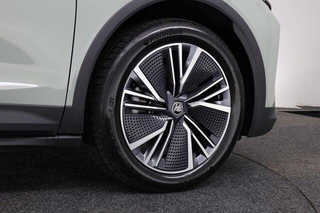 Skoda Elroq Intro Charlie 210 kW / 286 pk Business Edition | 20" Inch LMV | 3-Zone Climate Control | Camera | Dodehoekdetectie | Elektrische Kofferklep | Keyless-Entry | LED-Matrix verlichting | Stoel-, Stuur- en Achterbankverwarming | Timiano Green | Trekhaak El. We
