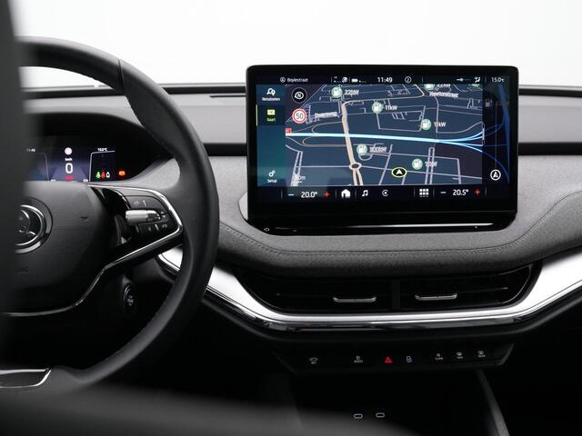 Skoda Enyaq iV 60 180 pk Selection | Achteruitrijcamera | Adaptive Cruise | Navigatie | Leder/stof | Carplay