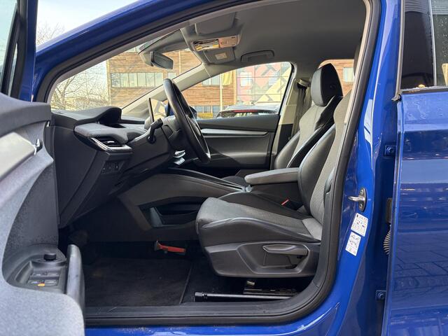 Skoda Enyaq iV 60 | Wegklapbare trekhaak | Stoelverwarming | Achteruitrijcamera | Warmtepomp