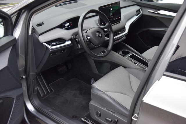 Skoda Enyaq iV 60 | Org. NL | BOVAG Garantie | Voorstoelen + Achterbank verwarmd | Achteruitrijcamera | Adaptive Cruise Control | Elektrisch verstelbare bestuurdersstoel | Verwarmde voorruit |