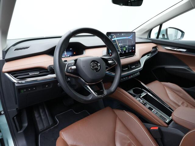 Skoda Enyaq iV 80 204 pk | Warmtepomp | Trekhaak | Cognac leder | Geheugenstoel | Adaptief onderstel | Matrix LED | Stuur-/achterbankverwarming | Achteruitrijcamera