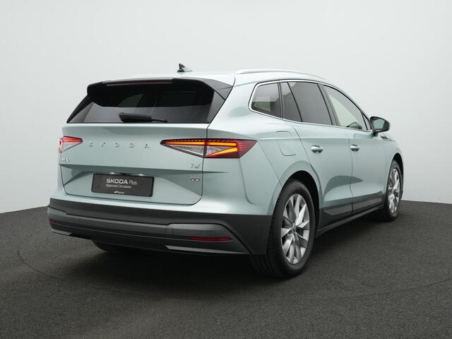 Skoda Enyaq iV 80 204 pk | Warmtepomp | Trekhaak | Cognac leder | Geheugenstoel | Adaptief onderstel | Matrix LED | Stuur-/achterbankverwarming | Achteruitrijcamera