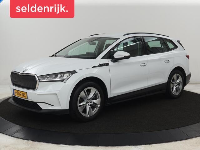 Skoda Enyaq iV 60 | SOH 92% | Trekhaak | Half leder | Sfeerverlichting | Carplay | Navigatie | 19'' | Cruise control | Parkeerhulp | Full LED