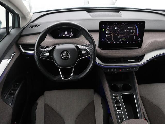 Skoda Enyaq iV 60 | SOH 91% | Trekhaak | Stoelverwarming | Camera | Sportstuur | Carplay | Navigatie | Cruise control | Full LED | Half leder | DAB | Parkeerhulp | Sfeerverlichting | Climate control