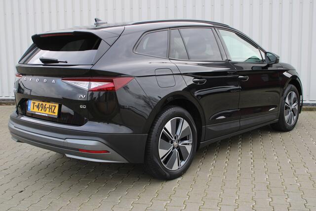 Skoda Enyaq iV 60 | Incl. 12 maanden garantie | Adaptive cruise | Climate control | Apple CarPlay | Stoel en stuurverwarming | Navigatie | Getint glas | LED koplampen | Achteruitrij camera | Draadloos telefoon lader |