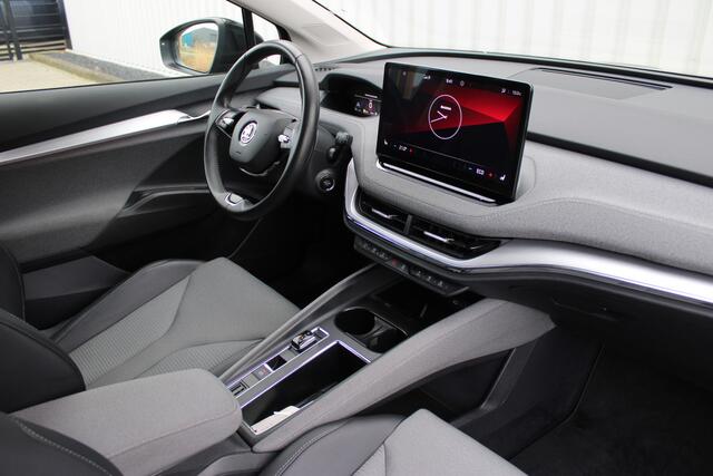 Skoda Enyaq iV 60 | Incl. 12 maanden garantie | Adaptive cruise | Climate control | Apple CarPlay | Stoel en stuurverwarming | Navigatie | Getint glas | LED koplampen | Achteruitrij camera | Draadloos telefoon lader |