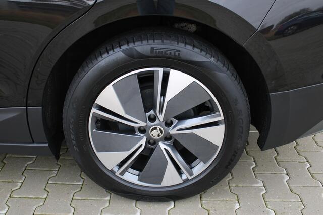 Skoda Enyaq iV 60 | Incl. 12 maanden garantie | Adaptive cruise | Climate control | Apple CarPlay | Stoel en stuurverwarming | Navigatie | Getint glas | LED koplampen | Achteruitrij camera | Draadloos telefoon lader |