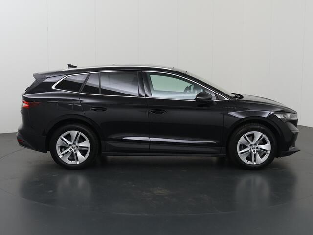 Skoda Enyaq iV 80 | SOH 93% | Lederen Interieur | Stuur/Stoelverwarming Voor + Achter | HUD | Navigatie | DAB | Camera | Sfeerverlichting | Adaptieve Cruise Control | Panoramadak |