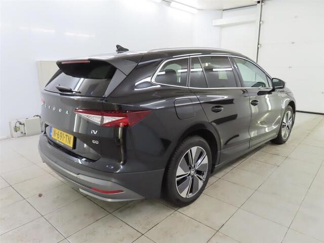 Skoda Enyaq iV 60 SFEER VERLICHTING | VIRTUAL DISPLAY | CAMERA | LED LAMPEN | ADAPTIEVE CRUISE | DODEHOEK DETECTIE | LEDER | KEYLESS | VERWARMDE STOELEN/STUUR | NAVIGATIE | AFNEEMBAAR TREKHAAK |