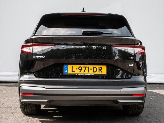 Skoda Enyaq iV 60 SOH 90% Panoramadak/ Stoel-stuurverwarming/ Camera/ Navigatie/ Carplay/ Memory/ Blindspot