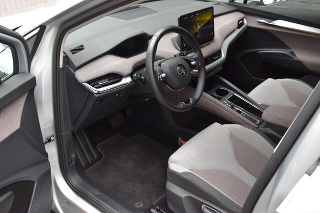 Skoda Enyaq iV 60 | Org. NL | BOVAG Garantie | SOH 93,45% | Warmtepomp | Apple Carplay/Android Auto | Stoelverwarming | 19'' Velgen | Parkeersensoren Achter | Full LED |