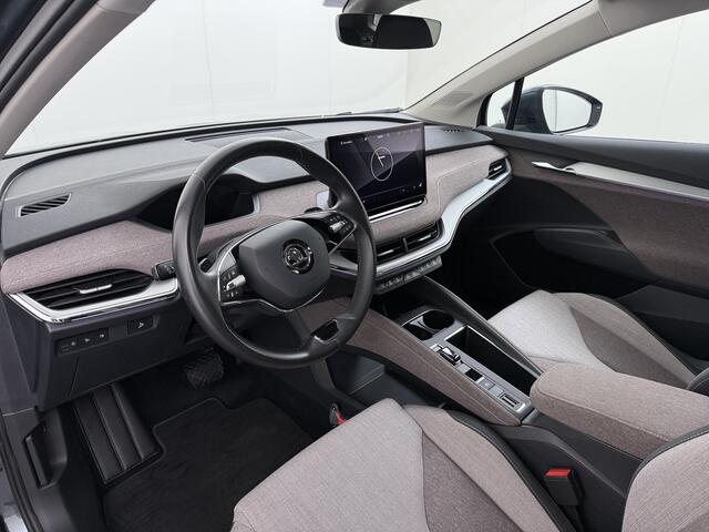 Skoda Enyaq iV 60 First Edition SOH 92% Adap.Cruise Camera Elek.Stoel+Memory Stoel+Stuurverwarming 3-Zone Ecc Apple Carplay Android Auto Pdc P-Assist Privacy Glas Lmv Led-Matrix Isofix Keyless advanced Bleutooth Rijstrooksensor 1e Eigenaar Dealeronderhouden Origineel Ne