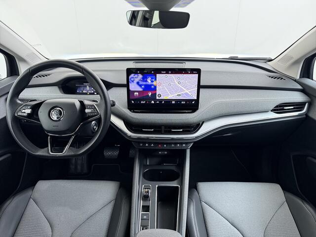 Skoda Enyaq iV 80 204PK SOH 91% Verlichte Grille Trekhaak Stoel+Stuurverwarming 3-Zone Ecc Camera Apple Carplay Android Auto Navi Sport Pakket Led Matrix Rijstrooksensor Isofix Keyless 1.000KG Trekgewicht Origineel Nederlandse Auto