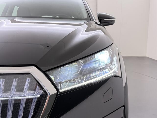 Skoda Enyaq iV 80 204PK SOH 91% Verlichte Grille Trekhaak Stoel+Stuurverwarming 3-Zone Ecc Camera Apple Carplay Android Auto Navi Sport Pakket Led Matrix Rijstrooksensor Isofix Keyless 1.000KG Trekgewicht Origineel Nederlandse Auto