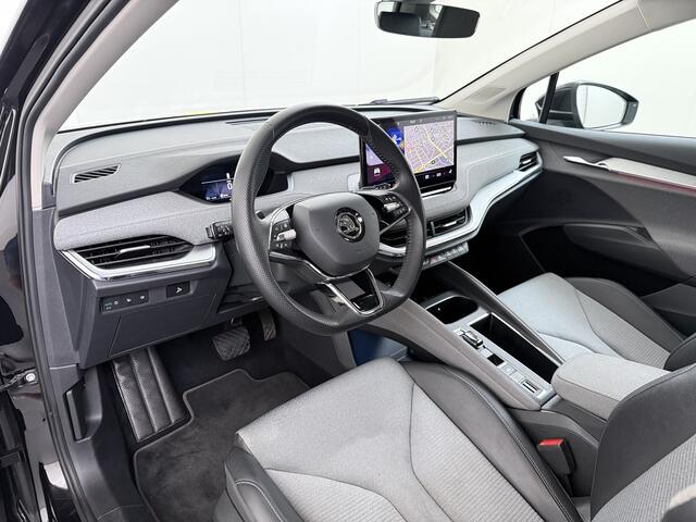 Skoda Enyaq iV 80 204PK SOH 91% Verlichte Grille Trekhaak Stoel+Stuurverwarming 3-Zone Ecc Camera Apple Carplay Android Auto Navi Sport Pakket Led Matrix Rijstrooksensor Isofix Keyless 1.000KG Trekgewicht Origineel Nederlandse Auto