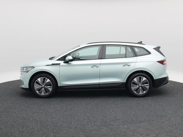 Skoda Enyaq iV 60 180 Pk | Stoel/Stuurverwarming | Adaptive Cruise | Camera | Warmtepomp | Half Leer | CarPlay | 19 Inch | 87.971 Km !!