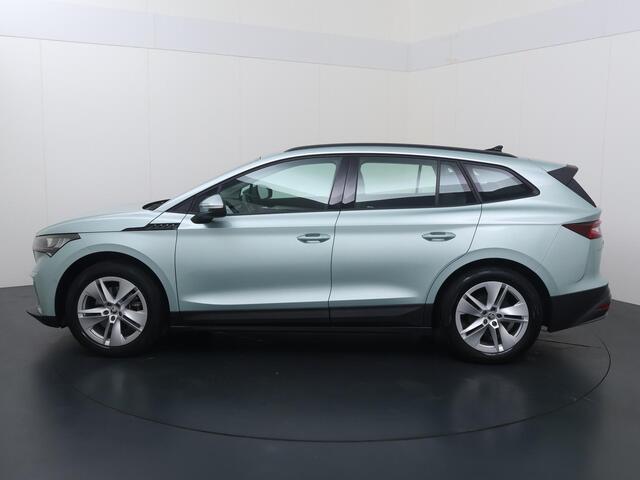 Skoda Enyaq iV 60 | 180 PK | SoH 89% | Trekhaak wegklapbaar | Cruise control | Climate control | LED verlichting | Navigatiesysteem | Parkeersensoren | Apple Carplay / Android Auto |