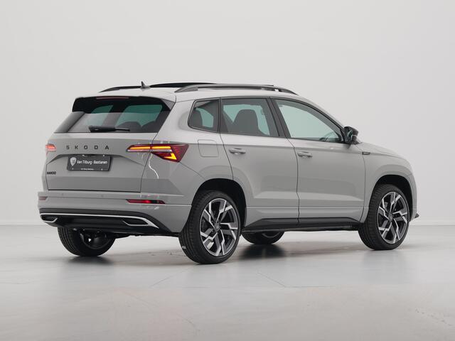 Skoda Karoq Sportline Business | Achteruitrijcamera | Airconditioning automatisch, 2-zone (Climatronic) | Cruise control met speedlimiter