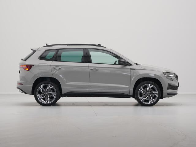 Skoda Karoq Sportline Business | Achteruitrijcamera | Airconditioning automatisch, 2-zone (Climatronic) | Cruise control met speedlimiter