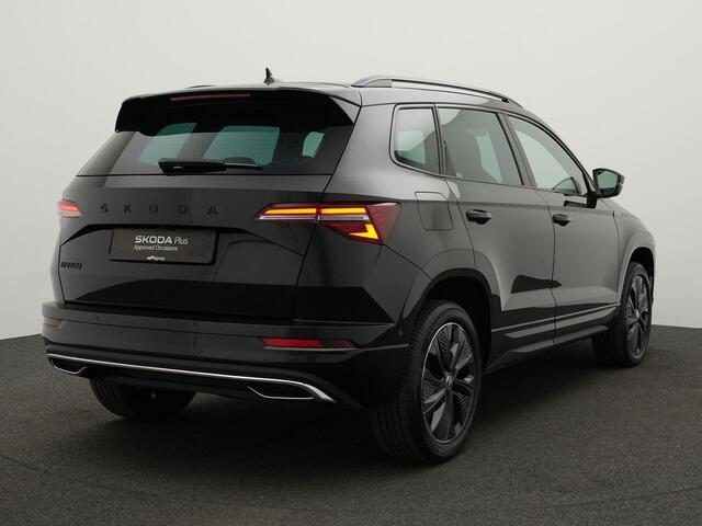 Skoda Karoq Sportline Business 1.5 TSI 150 pk DSG | Trekhaak | Matrix LED | Rondomzicht camera | Stoel-/achterbankverwarming | CANTON sound
