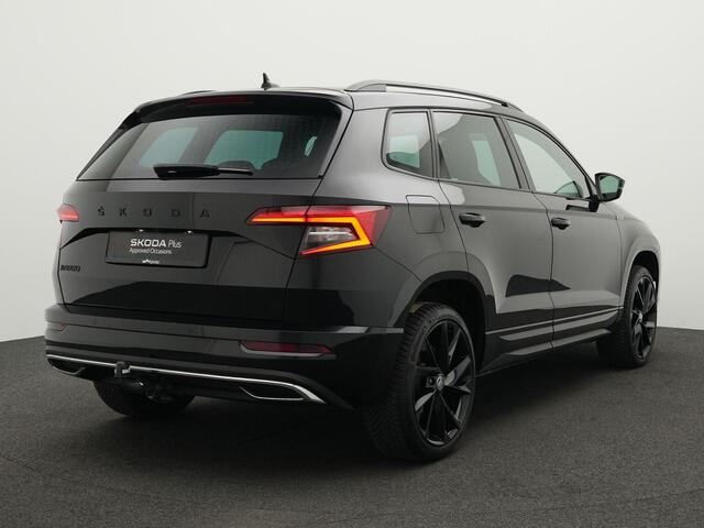 Skoda Karoq 1.5 TSI 150 pk DSG ACT Sportline Business | Trekhaak | Canton | Stuur-/stoelverwarming | Achteruitrijcamera | Navigatie