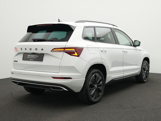 Skoda Karoq 1.5 TSI 150 pk DSG Sportline Business | LED Matrix | Trekhaak | Rondomzicht camera | CANTON sound | Stoel-/achterbankverwarming | Side Assist