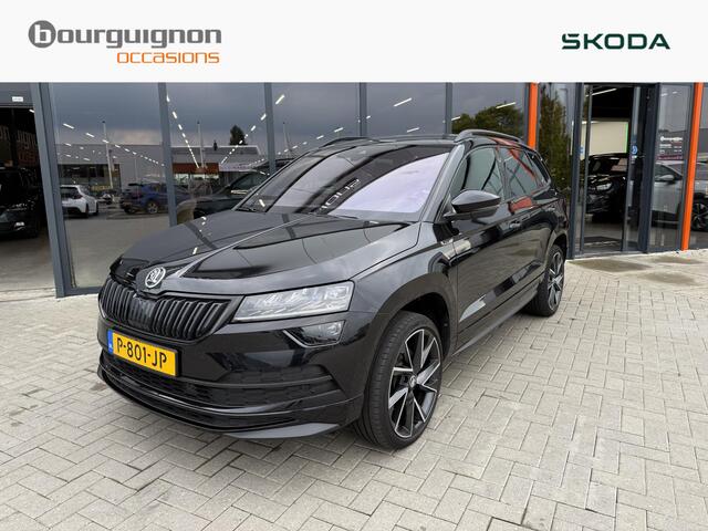 Skoda Karoq 1.5 TSi 150 Pk Automaat Sportline Business | Adaptive Cruise | Climate Control | Keyless | Stoelverwarming | Canton | Trekhaak | Navigatie | Camera | Carplay | LED | 123.026 Km!!