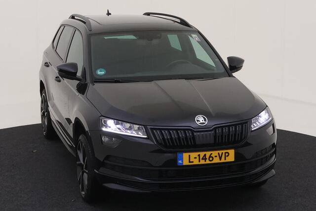 Skoda Karoq 1.5 TSI ACT Sportline Business / Panorama dak / Alcantara- Leder / Sfeerverlichting / Stoelverwarming / Virtual Cockpit