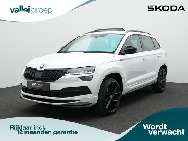 Skoda Karoq 1.5 TSI 150 pk DSG ACT Sportline Business | Panoramadak | Trekhaak | Navigatie Columbus | Stoelverwarming | CANTON sound | Park Assist | Carplay | 19 inch