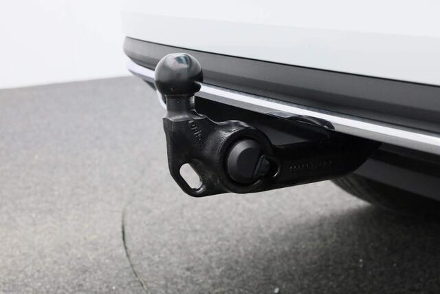 Skoda Karoq 1.5 TSI 150 pk DSG ACT Sportline Business | Panoramadak | Trekhaak | Navigatie Columbus | Stoelverwarming | CANTON sound | Park Assist | Carplay | 19 inch