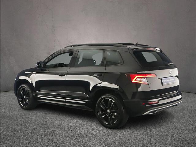 Skoda Karoq Sportline Business 1.5 TSI 150pk DSG Automaat Trekhaak, Panoramadak, Achteruitrijcamera, Adaptive cruise control, Navigatie, Elektrische achterklep