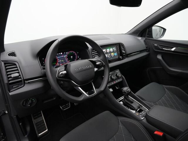 Skoda Karoq 1.5 TSI ACT 150 pk DSG Sportline Business | Canton | Stuur-/stoelverwarming | Achteruitrijcamera | Navigatie | Adaptive Cruise