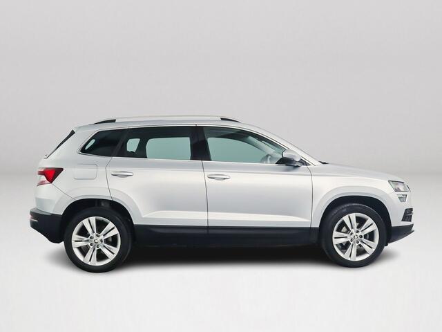 Skoda Karoq 1.0 TSI Ambition Business Aut. | Stoelverwarming | Navigatie | Parkeersensoren | Extra getint glas