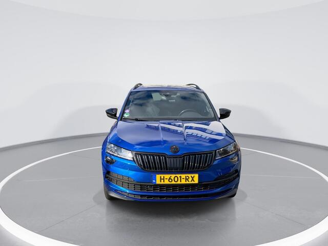 Skoda Karoq 1.5 TSI ACT 150pk DSG Sportline Business · Panoramadak · Camera · Trekhaak · Apple/Android Car Play · 19'' LMV · Keyless ·