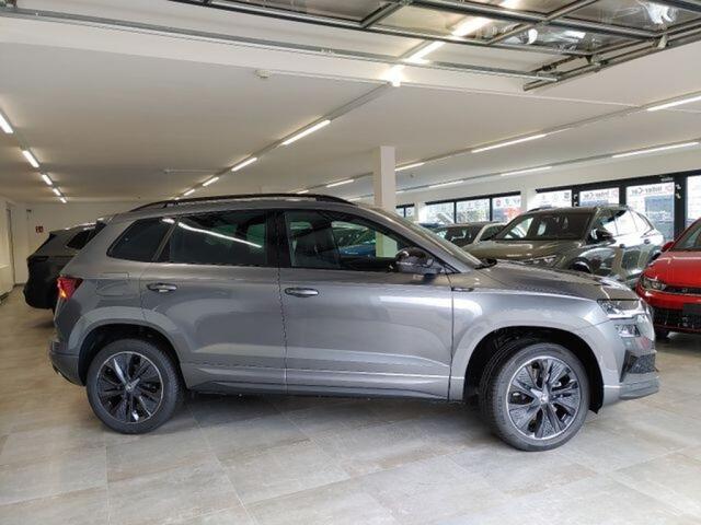 Skoda Karoq 1.5 TSI DSG SPORTLINE TREKHAAK/CAMERA/CARPLAY/ACC/STOELVERW/E-KLEP